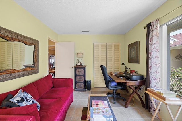 4109 Carriage Dr Unit 23, Sarasota, FL 34241 - office area featuring tile patterned flooring