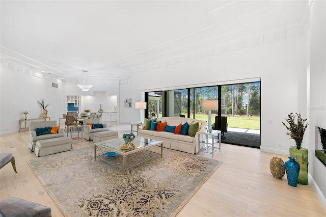 7051 Turtle Ln, Sarasota, FL 34241 - living area featuring wood finished floors and a towering ceiling