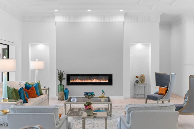 7051 Turtle Ln, Sarasota, FL 34241 - living room featuring a glass covered fireplace, wood finished floors, recessed lighting, and a high ceiling