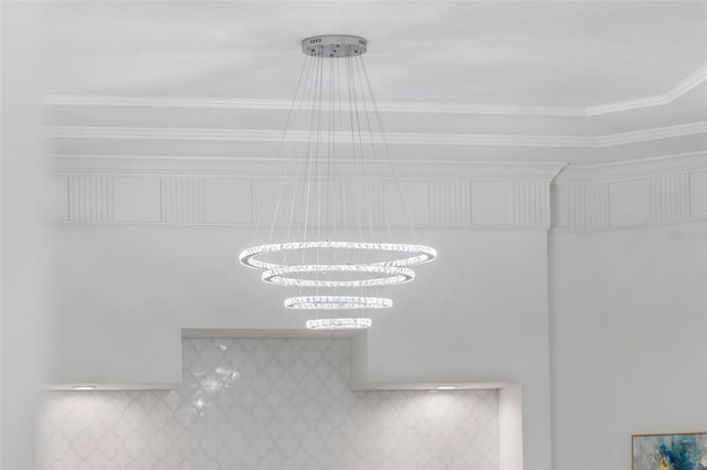 7051 Turtle Ln, Sarasota, FL 34241 - detailed view of ornamental molding, a chandelier, and tasteful backsplash