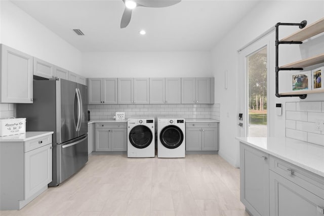 7051 Turtle Ln, Sarasota, FL 34241 - washroom featuring washing machine and dryer and a ceiling fan