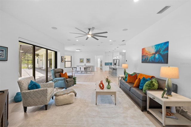 7051 Turtle Ln, Sarasota, FL 34241 - living area featuring ceiling fan, light wood-style flooring, and recessed lighting