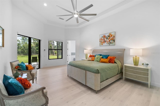 7051 Turtle Ln, Sarasota, FL 34241 - bedroom featuring light wood-type flooring, a towering ceiling, recessed lighting, and ceiling fan