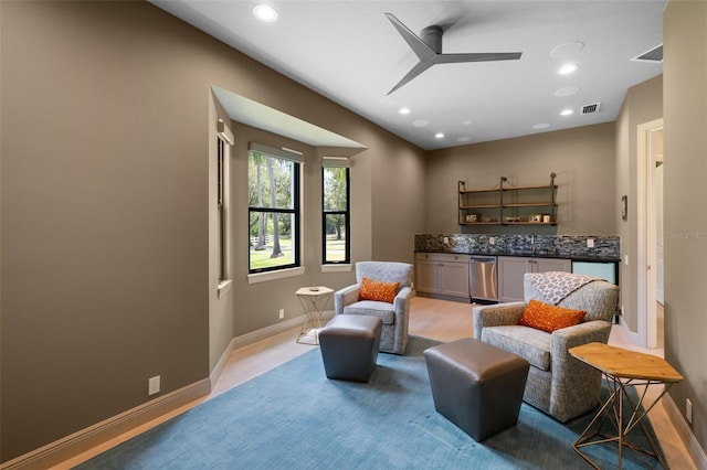 7051 Turtle Ln, Sarasota, FL 34241 - living area with a dry bar, a ceiling fan, and recessed lighting