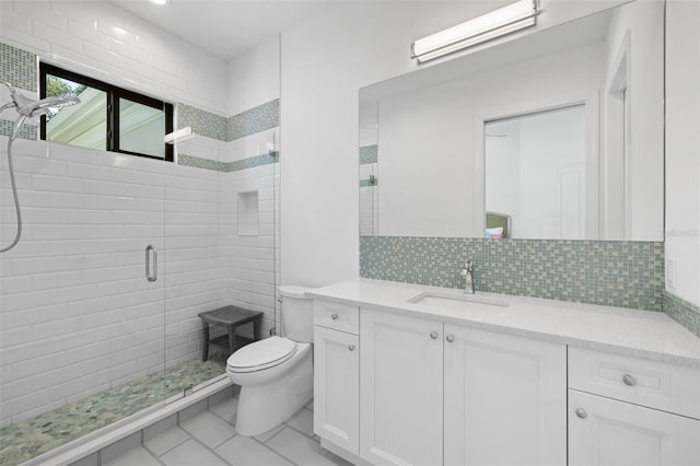 7051 Turtle Ln, Sarasota, FL 34241 - full bath with vanity, tile patterned floors, backsplash, and a tile shower