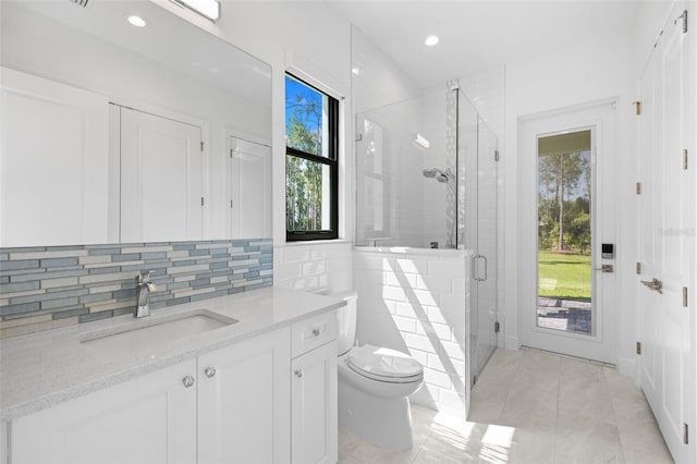 7051 Turtle Ln, Sarasota, FL 34241 - full bathroom with vanity, a stall shower, tile patterned flooring, decorative backsplash, and recessed lighting
