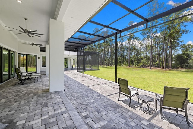 7051 Turtle Ln, Sarasota, FL 34241 - view of patio featuring a ceiling fan and glass enclosure
