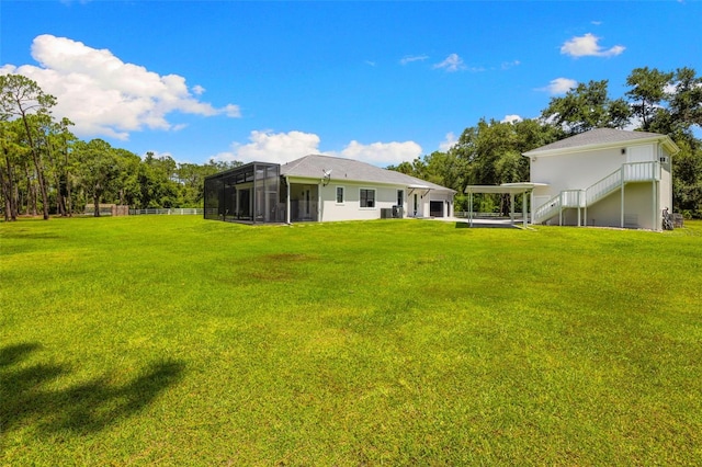 7051 Turtle Ln, Sarasota, FL 34241 - view of grassy yard with stairs
