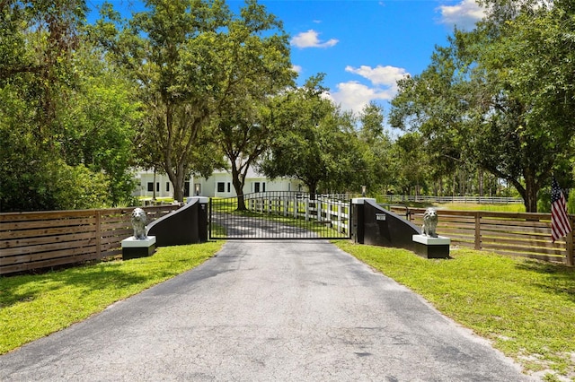 7051 Turtle Ln, Sarasota, FL 34241 - view of street with a gate