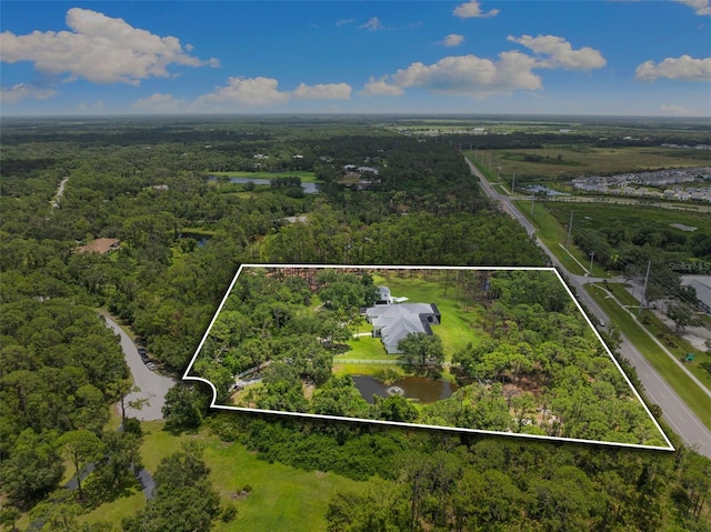 7051 Turtle Ln, Sarasota, FL 34241 - aerial view of property and surrounding area with property boundaries highlighted and a nearby body of water