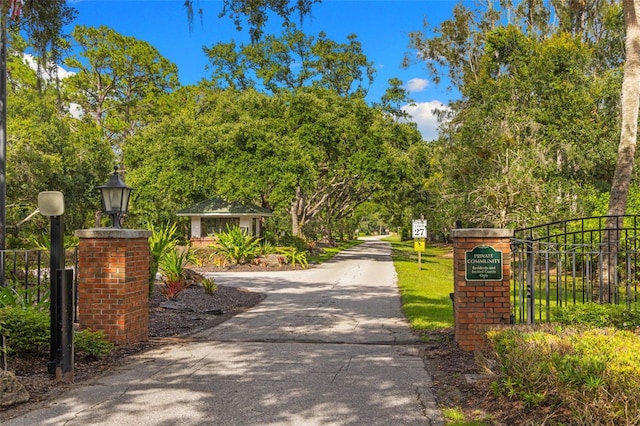 7051 Turtle Ln, Sarasota, FL 34241 - view of road featuring traffic signs