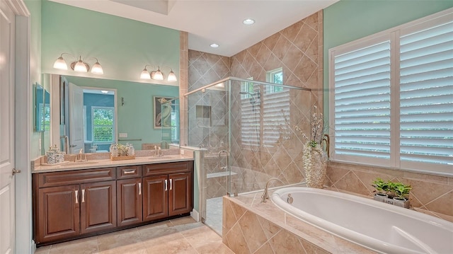 11603 Bluebird Pl, Lakewood Ranch, FL 34211 - bathroom with a garden tub, a shower stall, double vanity, and recessed lighting