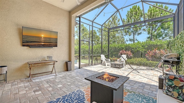 11603 Bluebird Pl, Lakewood Ranch, FL 34211 - view of patio featuring an outdoor fire pit and a lanai