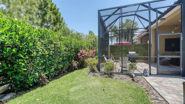 11603 Bluebird Pl, Lakewood Ranch, FL 34211 - view of grassy yard featuring a patio and a lanai