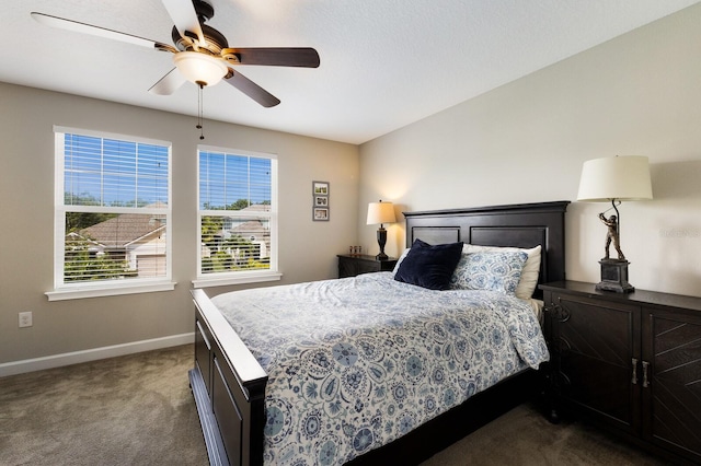 11411 Spring Gate Trl, Bradenton, FL 34211 - bedroom featuring dark colored carpet, baseboards, and ceiling fan