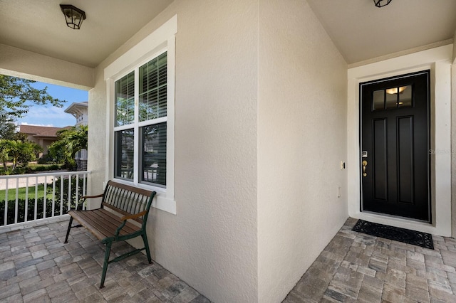 11411 Spring Gate Trl, Bradenton, FL 34211 - entrance to property with stucco siding and covered porch