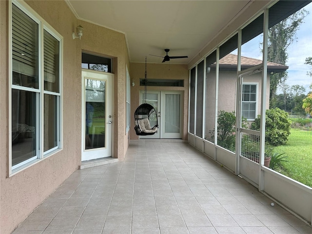 3192 Oaks Bnd, Bowling Green, FL 33834 - unfurnished sunroom featuring a ceiling fan and healthy amount of natural light
