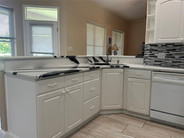 3192 Oaks Bnd, Bowling Green, FL 33834 - kitchen with dishwasher, open shelves, white cabinetry, backsplash, and light wood finished floors