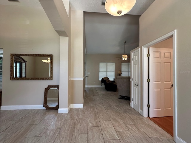 3192 Oaks Bnd, Bowling Green, FL 33834 - hallway featuring wood finish floors and a high ceiling