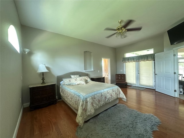 3192 Oaks Bnd, Bowling Green, FL 33834 - bedroom with access to outside, wood finished floors, and ceiling fan