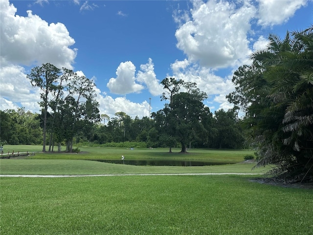 3192 Oaks Bnd, Bowling Green, FL 33834 - view of home's community featuring a water view, a yard, and view of wooded area