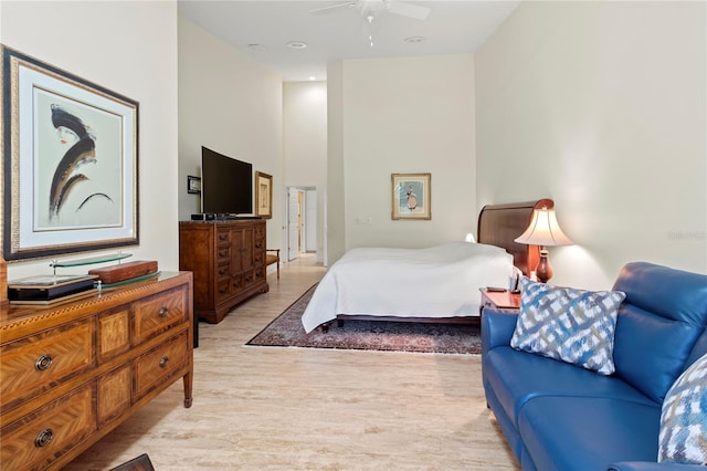 7331 Villa D Este Dr, Sarasota, FL 34238 - bedroom featuring light wood-type flooring, a high ceiling, and ceiling fan