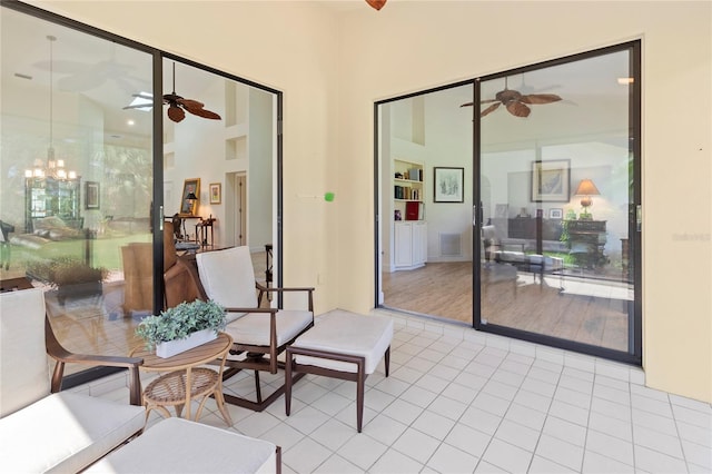 7331 Villa D Este Dr, Sarasota, FL 34238 - sunroom / solarium with a chandelier