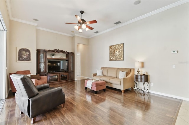 9008 Brookfield Ter, Bradenton, FL 34212 - living area with a ceiling fan, ornamental molding, baseboards, and wood finished floors