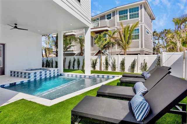 103 4th St N Unit A, Bradenton Beach, FL 34217 - back of house with an in-ground hot tub and ceiling fan