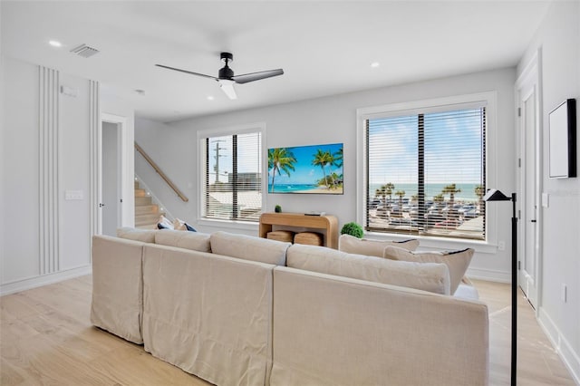 103 4th St N Unit A, Bradenton Beach, FL 34217 - living room featuring stairs, light wood-type flooring, a ceiling fan, baseboards, and recessed lighting