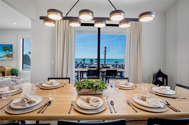 103 4th St N Unit A, Bradenton Beach, FL 34217 - dining area featuring a water view