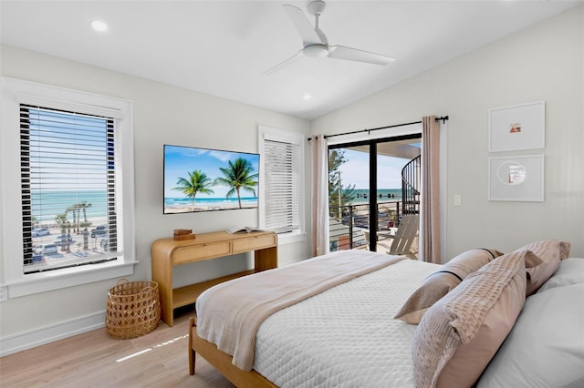 103 4th St N Unit A, Bradenton Beach, FL 34217 - bedroom with access to outside, wood finished floors, lofted ceiling, recessed lighting, and baseboards