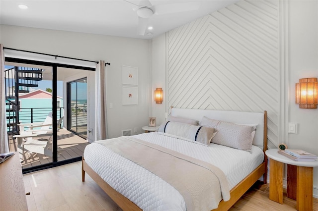 103 4th St N Unit A, Bradenton Beach, FL 34217 - bedroom featuring access to outside, light wood finished floors, and recessed lighting
