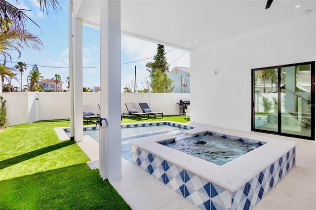 103 4th St N Unit A, Bradenton Beach, FL 34217 - view of patio with an in-ground hot tub