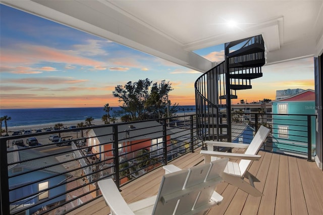103 4th St N Unit A, Bradenton Beach, FL 34217 - deck at dusk featuring a water view