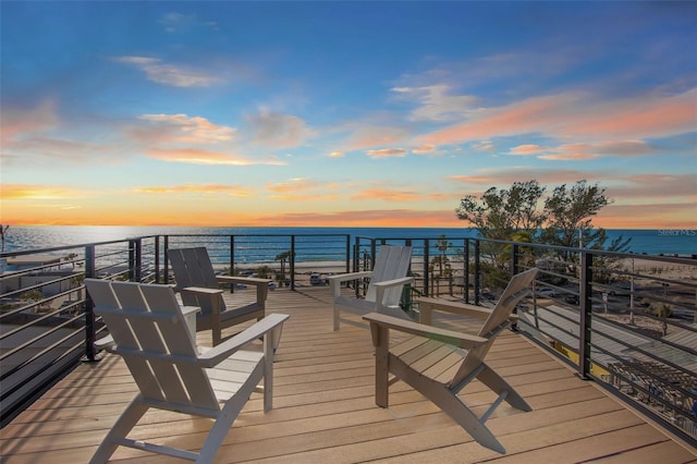 103 4th St N Unit A, Bradenton Beach, FL 34217 - deck at dusk featuring view of water and beach