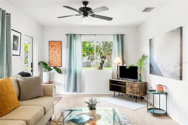 302 Pavonia Rd, Nokomis, FL 34275 - living room featuring plenty of natural light, a ceiling fan, and baseboards