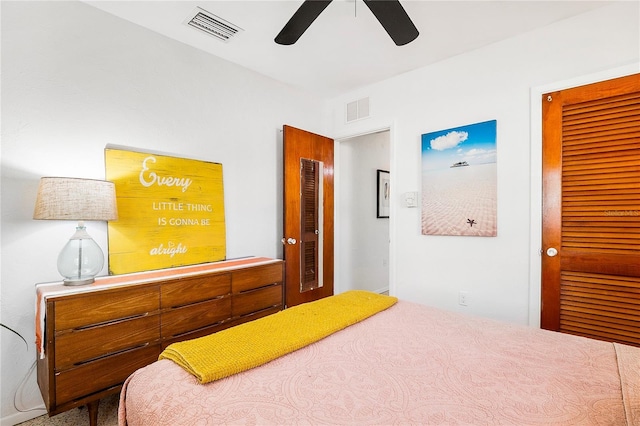 302 Pavonia Rd, Nokomis, FL 34275 - carpeted bedroom with a closet and ceiling fan