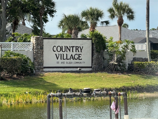 2841 74th St W Unit 2841, Bradenton, FL 34209 - community / neighborhood sign with a water view and a yard