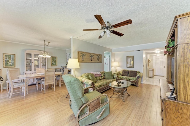 6108 7th Ave W Unit 6108, Bradenton, FL 34209 - living area with ceiling fan, light wood finished floors, ornamental molding, a textured ceiling, and a chandelier