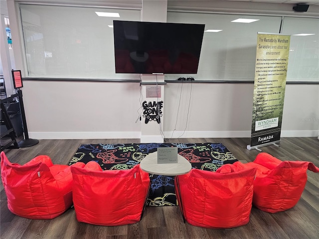 7150 N Tamiami Trl Unit C100, Sarasota, FL 34243 - living room with wood finished floors and baseboards