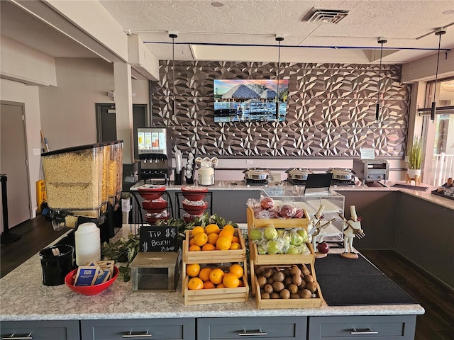 7150 N Tamiami Trl Unit C100, Sarasota, FL 34243 - bar area featuring wood finished floors and a textured ceiling