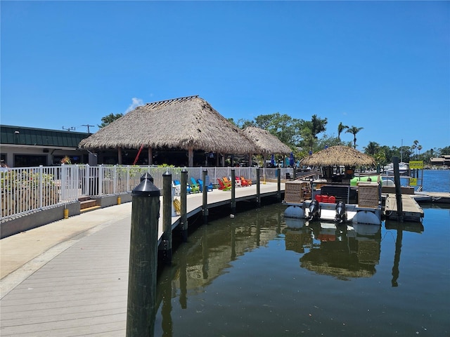 7150 N Tamiami Trl Unit C100, Sarasota, FL 34243 - dock with a gazebo and a water view