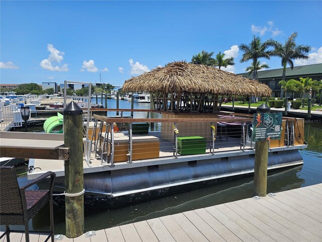 7150 N Tamiami Trl Unit C100, Sarasota, FL 34243 - dock with a water view and a gazebo