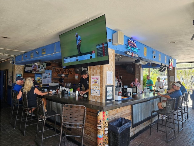 7150 N Tamiami Trl Unit C100, Sarasota, FL 34243 - indoor dry bar with brick flooring