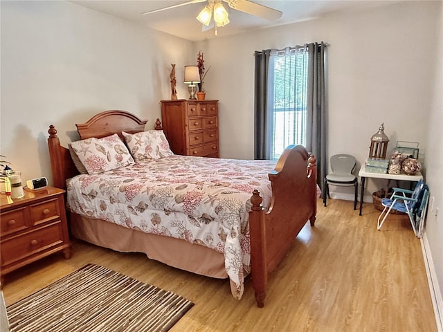 3828 6th Ave W, Palmetto, FL 34221 - bedroom featuring light wood finished floors and a ceiling fan