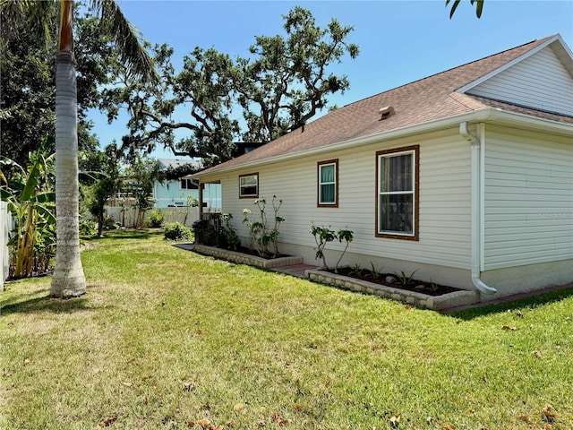 3828 6th Ave W, Palmetto, FL 34221 - back of house with roof with shingles