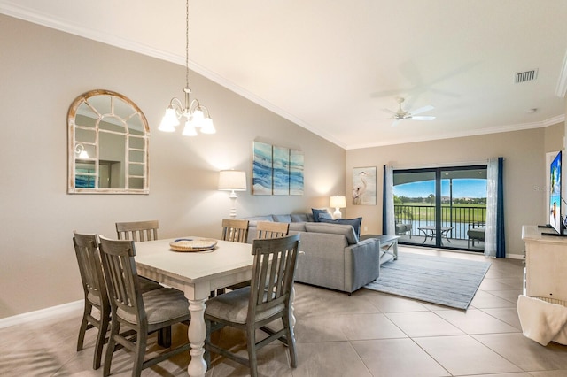 5624 Palmer Cir Unit 206, Bradenton, FL 34211 - dining area featuring a ceiling fan, ornamental molding, a chandelier, and light tile patterned floors