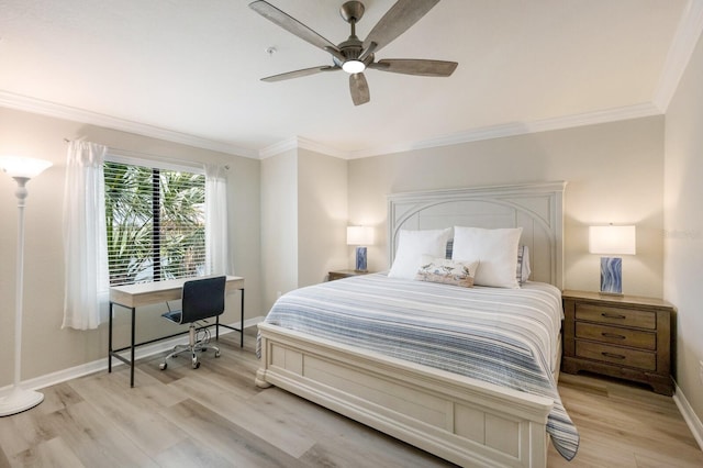 5624 Palmer Cir Unit 206, Bradenton, FL 34211 - bedroom featuring light wood-style floors, ornamental molding, a ceiling fan, and an office area