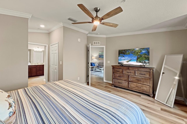 5624 Palmer Cir Unit 206, Bradenton, FL 34211 - bedroom with light wood finished floors, crown molding, ensuite bathroom, recessed lighting, and a ceiling fan